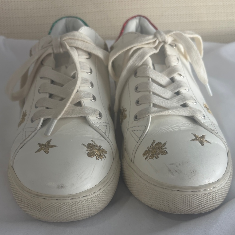 White Sneakers with Gold Star Accents
